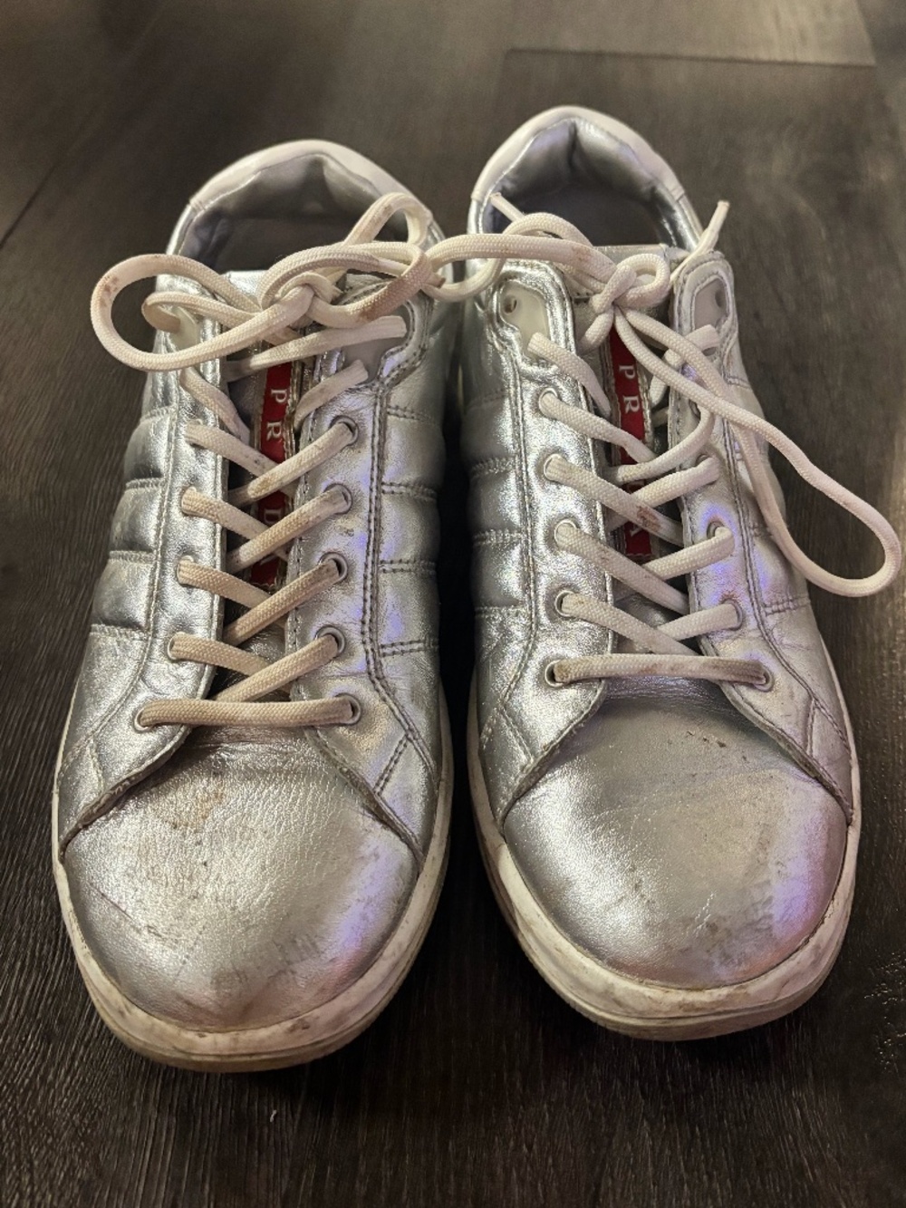 Prada Linea Rossa sneakers in metallic silver leather